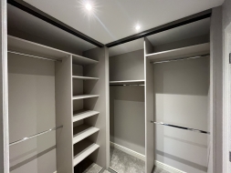 L shaped wardrobe in cashmere to maximize the use of the space, fitted in Stillington